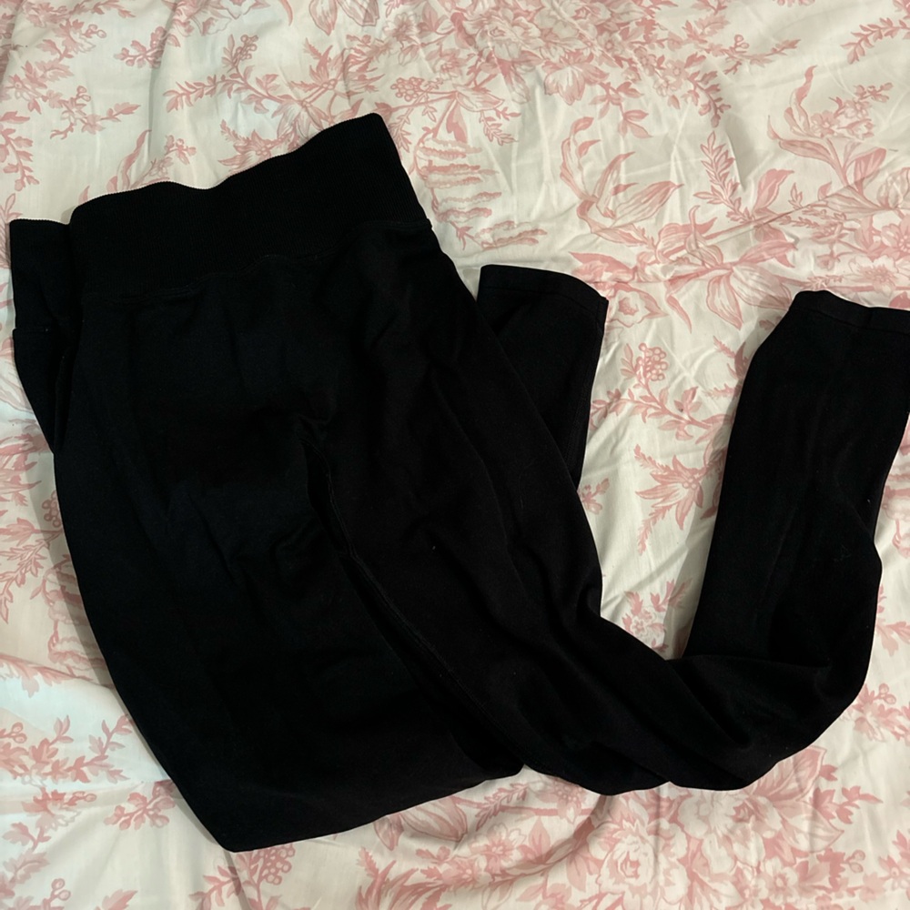 black VS pink leggings